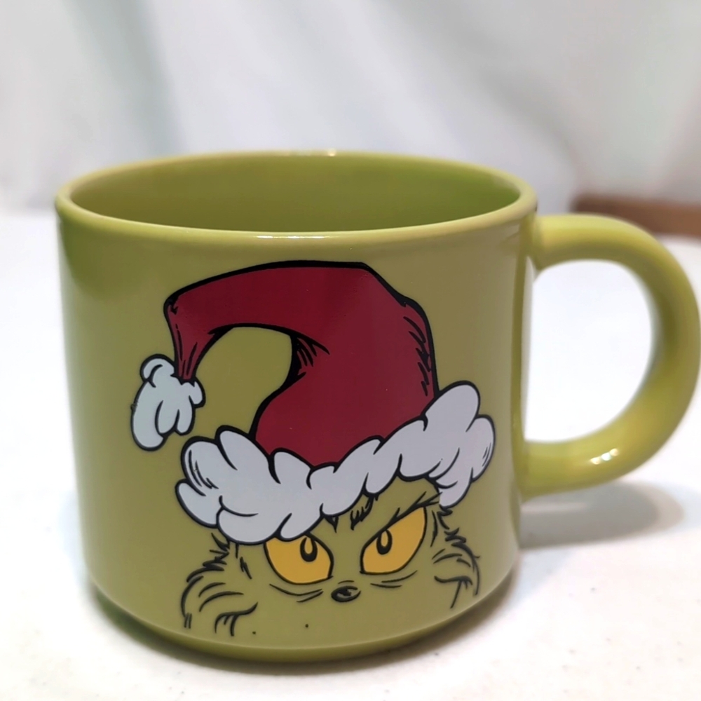 Grinch green 12 ounce Christmas mug Microwave and dishwasher safe
